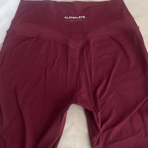 ALPHALETE LEGGINGS SIZE MEDIUM